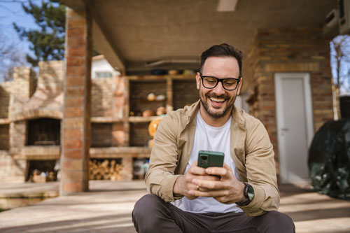 Member checking his credit score on his phone